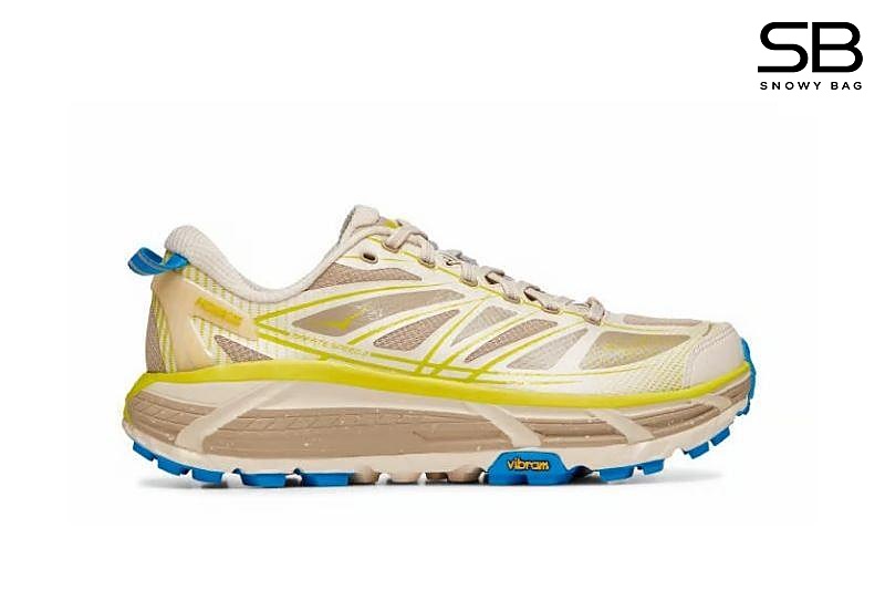 Giày Hoka Mafate Speed 2 Eggnog Oxford Tan Be Đế Xanh, thiết kế thể thao hiện đại.