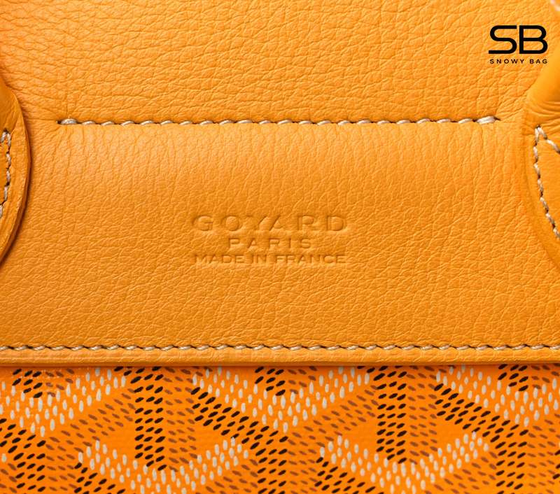 Da bê trên túi Goyard màu vàng