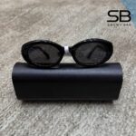 Mắt kính Miu Miu Sunglasses MU B09SF 16K08Z Black góc nghiêng chi tiết